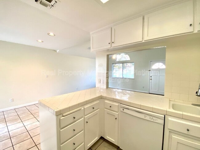 Building Photo - 5811 W Sample Ave