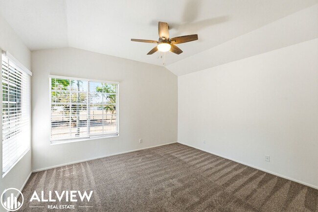 Building Photo - Fully Renovated 2 Bed Townhome with Private Patio, 2-Car Garage & Community Pool