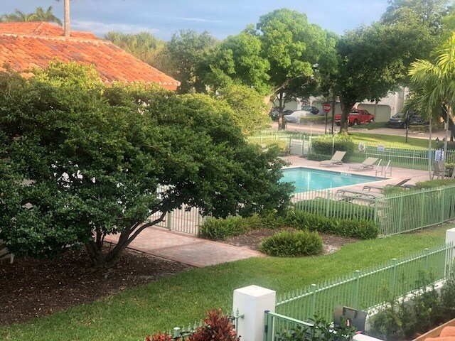 View of pool and gym from house - 4412 Hidden Harbour Ter