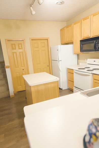 Kitchen with storage - 13040 Europa Trail Way N