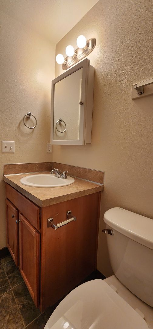 Building Photo - Ground-Level Apartment Available Now at Sunset Villa!