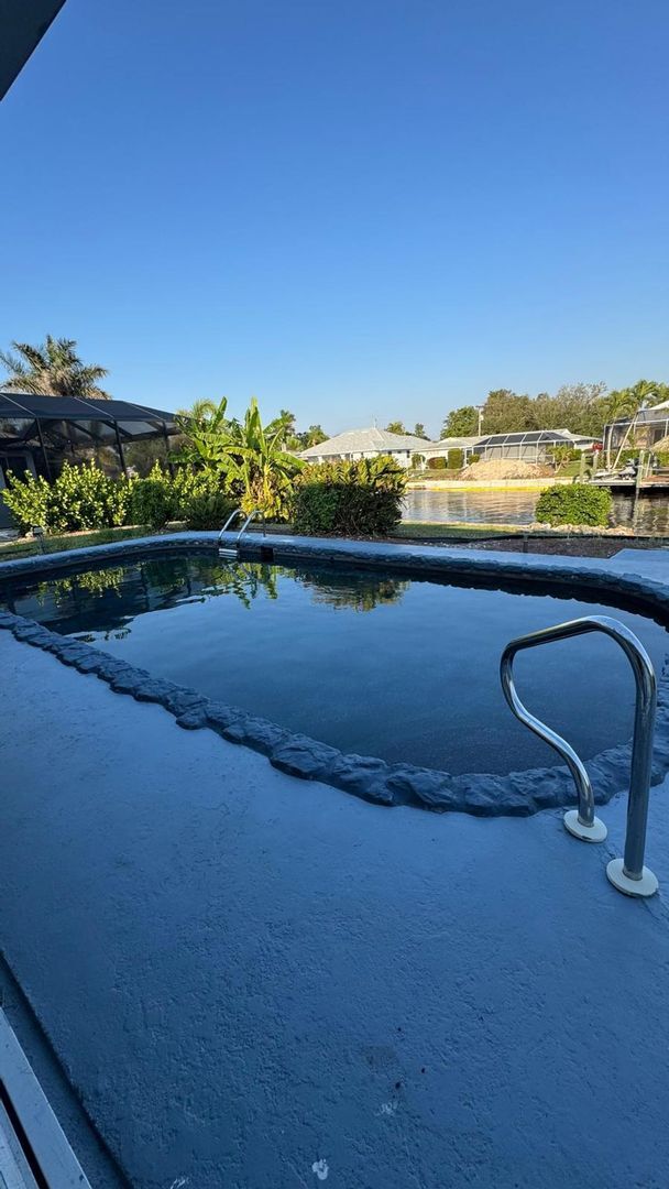 Building Photo - Welcome to your dream rental in Cape Coral! This fully remodeled, MONTH TO MONTH available home.