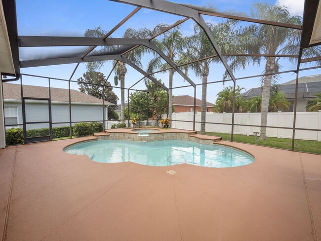 Building Photo - Gated Community Gem 4/3 with Pool & Spa in...