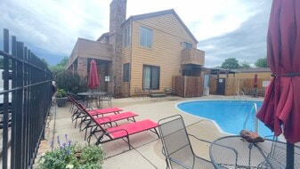 Looking at the Top Floor Condo from Pool - 3440 S Delaware Ave