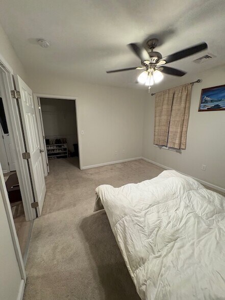 Bedroom with walk in closet - 9 E Union Blvd