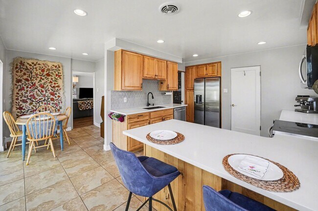 Building Photo - Sunlit Wheat Ridge Gem with Huge Wooded Backyard