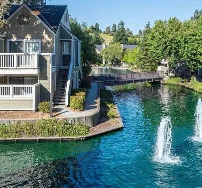 Building Photo - Beautiful 2-Bedroom Condo with Serene Wate...
