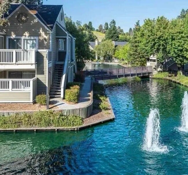 Building Photo - Beautiful 2-Bedroom Condo with Serene Water Views and Modern Amenities