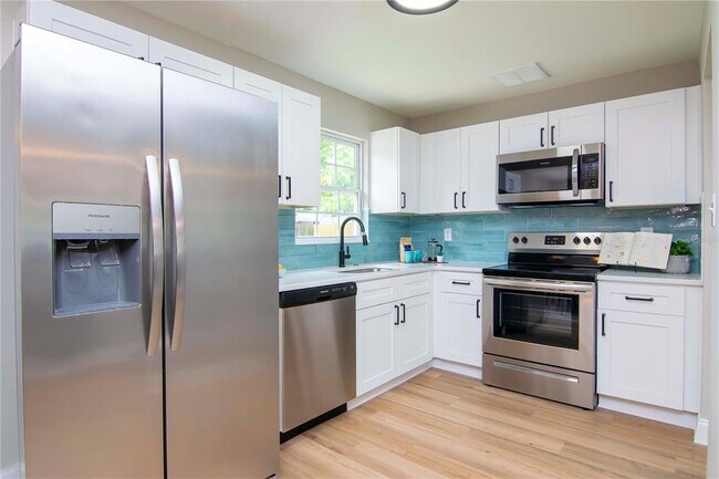 Building Photo - 3708 W Tyson Ave