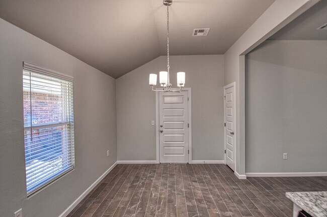 Building Photo - New Construction in Varenna Landing! Storm shelter and lawn care included!