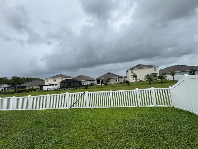 Building Photo - 3BD/2BA Modern Florida Home Living Reimagined — Solar-Powered Elegance Near I-95 in Edgewater! FU...