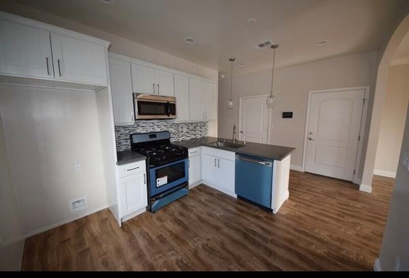 Building Photo - 6261 W Olympic Blvd