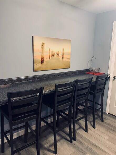 Countertop table with bar stool chairs - 533 Hinton St