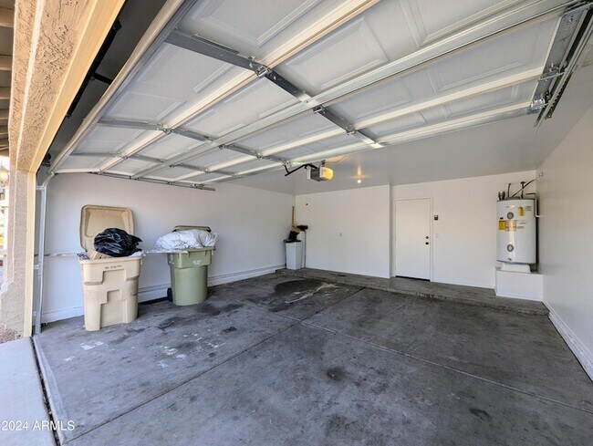 Building Photo - 7059 W Gardenia Ave