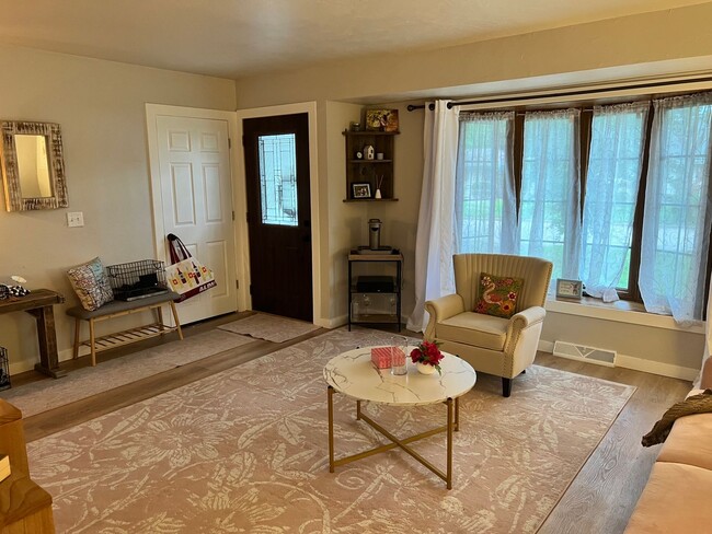 Building Photo - Spacious 4-Bedroom Home with Finished Basement & Garage