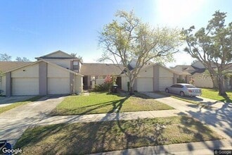 Building Photo - 12121 Augusta Woods Cir