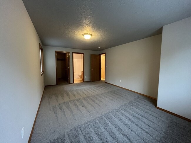 Building Photo - 3-Bed Home with Fireplace, Fenced Backyard, 2 Car Garage & Front Patio!