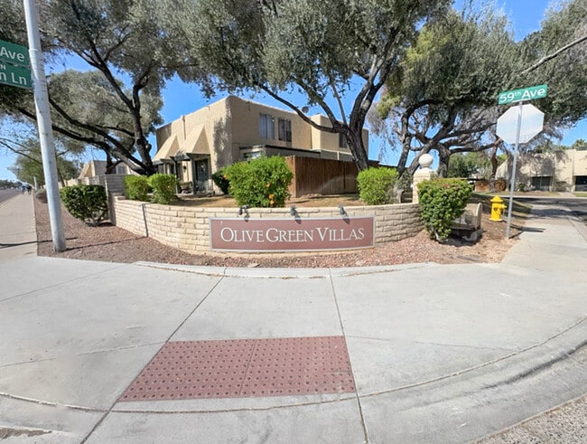 Building Photo - 2Bed/1.5Bath Townhouse at Olive Ave/63rd Ave! Ready for Immediate Move-In!