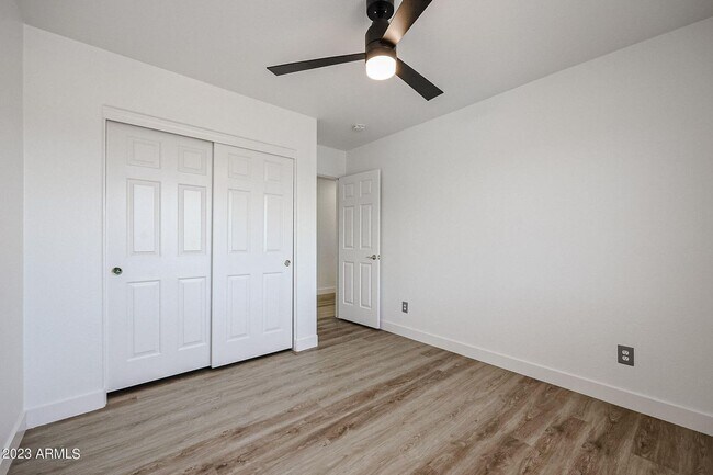 Building Photo - BRAND NEW 5 BEDROOM HOME IN PHOENIX