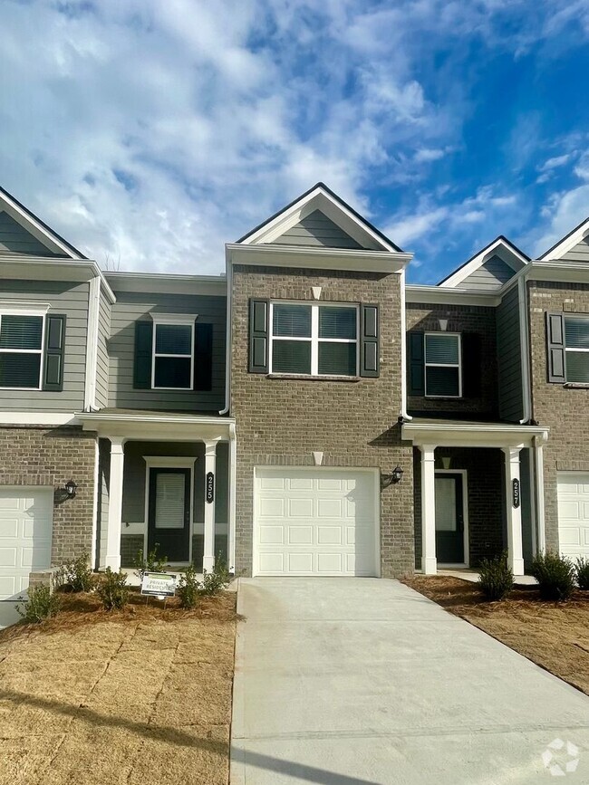 Building Photo - Beautiful New Townhome Close to Everything