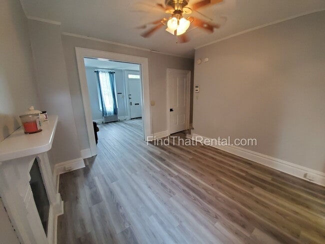 Building Photo - Charming Historic Retreat with Private Fenced Yard & Parking – Prime Downtown Location