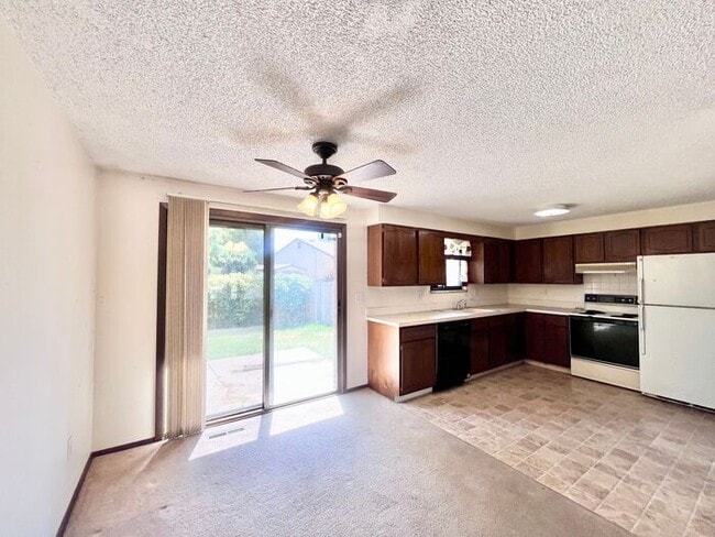 Building Photo - NEW PAINT, FLOORING & APPLIANCES! 2 Bedroo...
