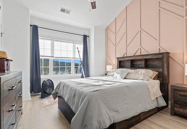 Building Photo - Stunning Top-Floor 2-Bedroom Retreat with Serene Pond Views!