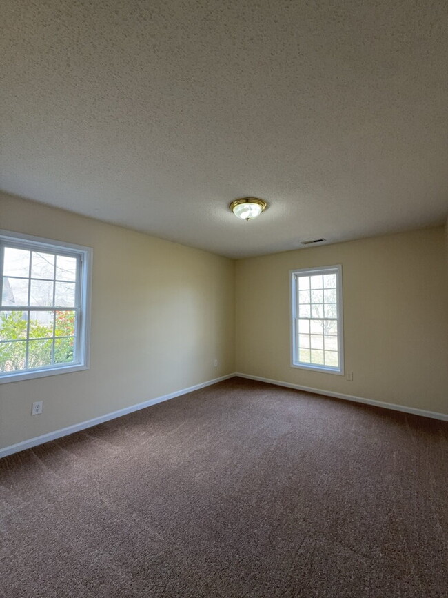 Building Photo - Three Bedroom Two and Half Full Bathroom R...