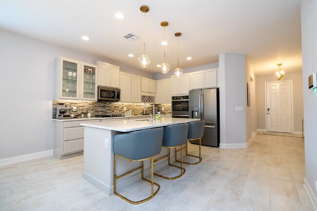 Building Photo - "Spacious 4-Bedroom Retreat with 3 Full Baths in Winter Garden's Serene Sanctuary"