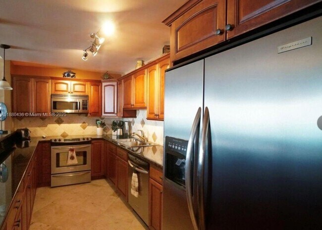 Building Photo - 19370 Collins Ave