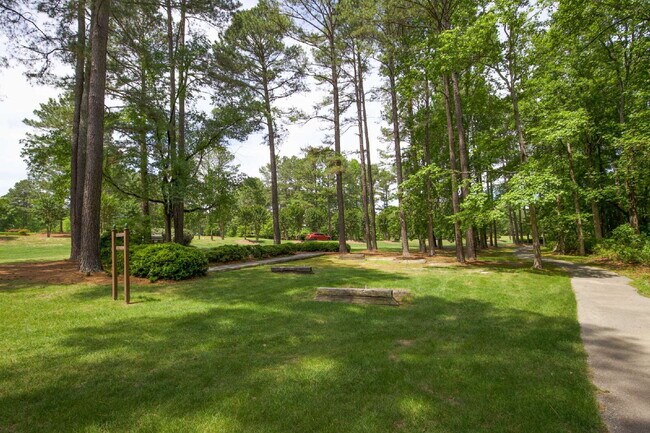 Building Photo - "Spacious 4-Bedroom Gem with 2.5 Baths at ...