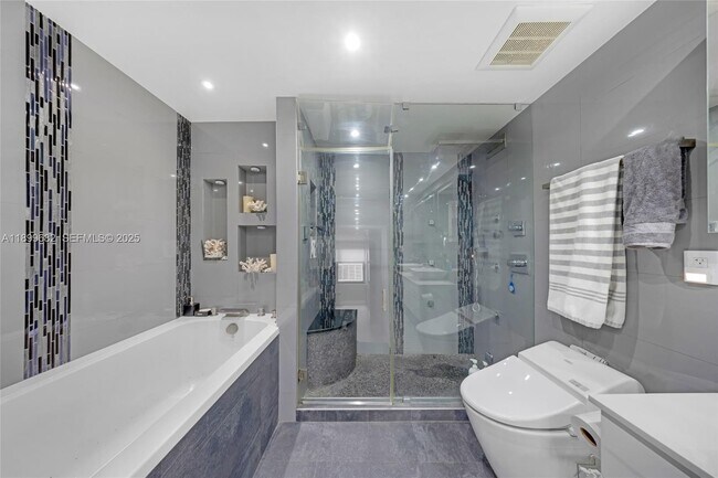 Building Photo - 9801 Collins Ave