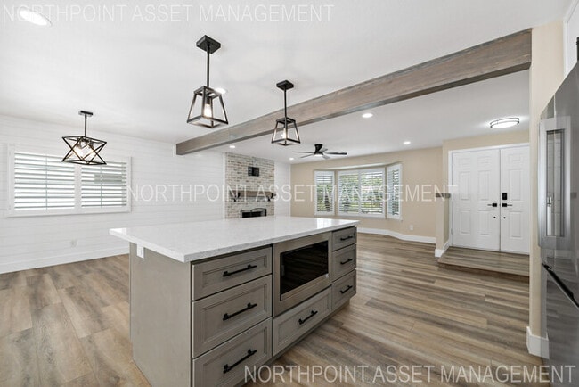 Building Photo - Brand New Remodel – Stunning Pool Home wit...