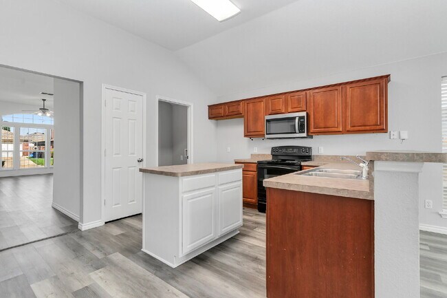 Building Photo - Welcome home to this beautifully maintained 4-bedroom, 2-bath, single-story home in the desirable...