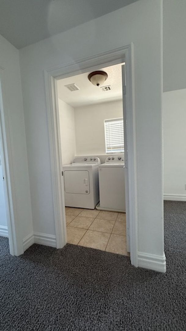 Building Photo - STUNNING 2 STORY HOME IN A GUARD GATED COM...