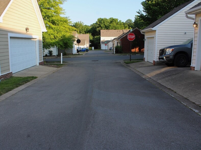 The parking area is secluded in a small alleyway. - 7837 Heaton Way