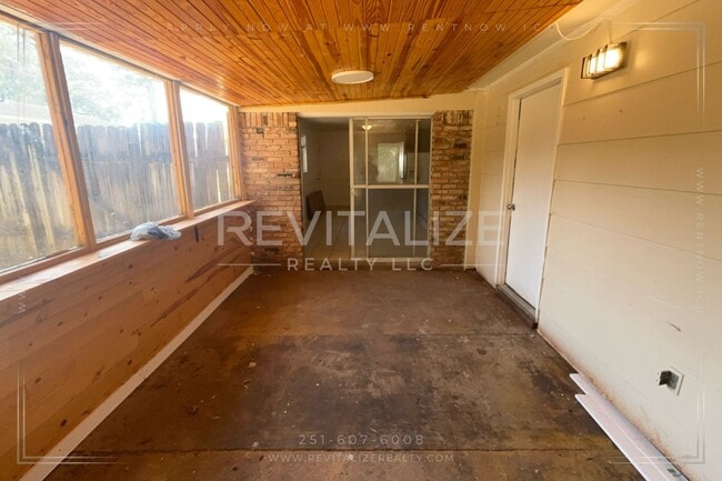 Building Photo - Brick Home with Carport