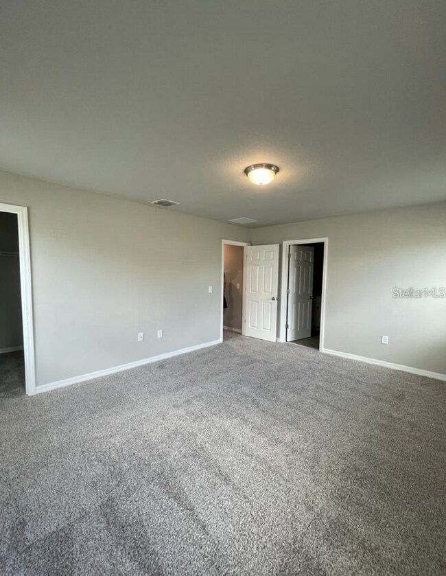 Building Photo - Beautiful corner unit townhouse features an abundance of natural light.