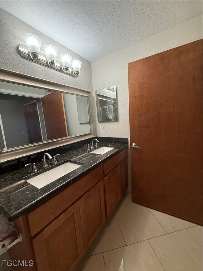 Building Photo - 8555 Bernwood Cove Loop