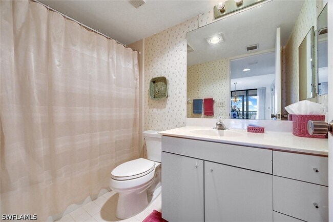 Building Photo - 6000 Pelican Bay Blvd