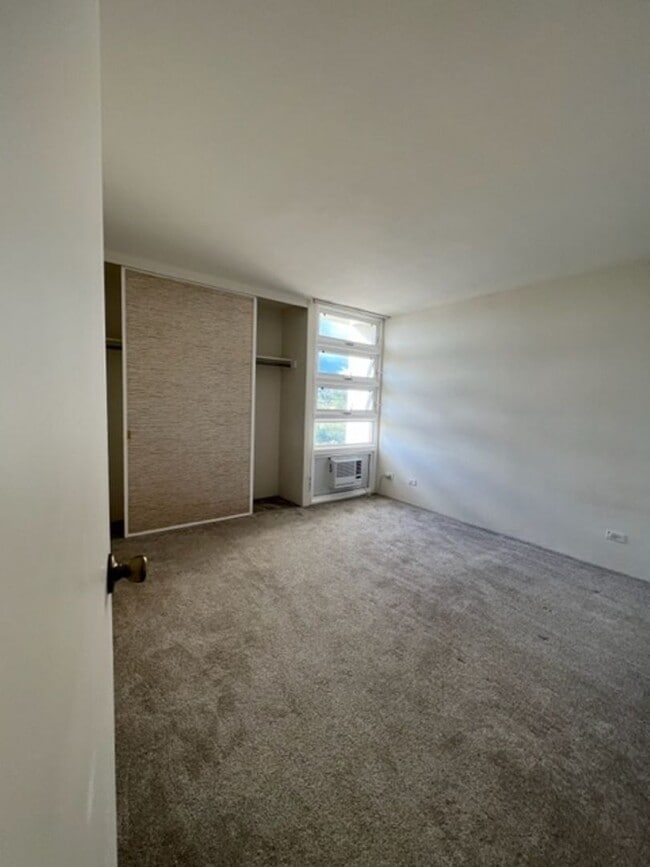 Building Photo - The Pearl- 2 bedrooom one bath unit with 2 assigned parking stalls!