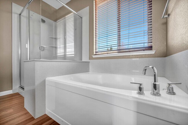 Building Photo - Sun-Filled, Spacious Living with a Three-Car Garage