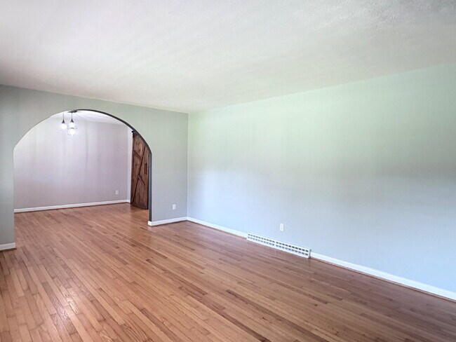 Building Photo - Updated 3BR Home in Beaver Lake | Fenced Yard, Garage, Covered Porch & Outdoor Fireplace | Pet Fr...