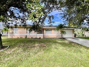 Building Photo - Live Comfortably in SE Cape Coral – Bright, Remodeled Home for Rent
