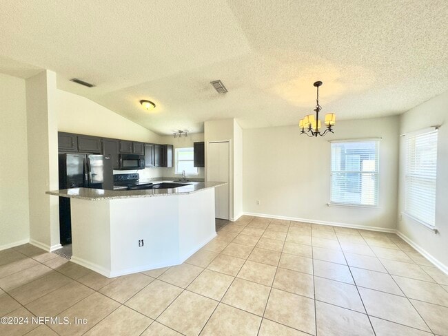 Building Photo - 3336 Cancun Dr E
