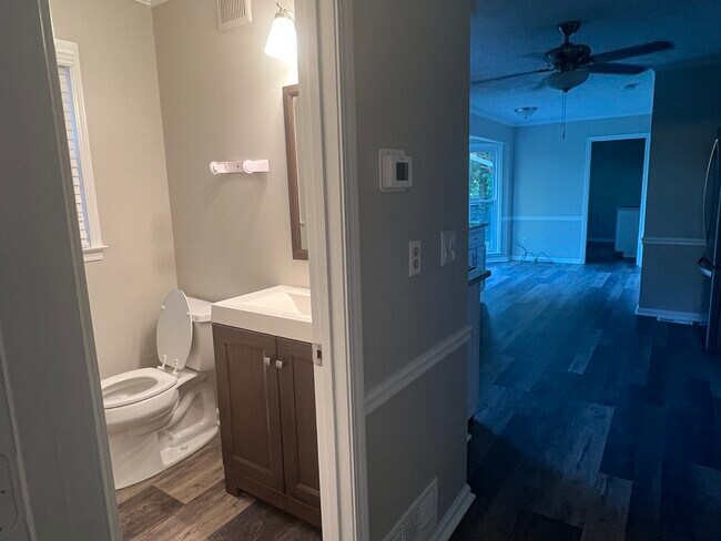 1/2 bath off kitchen - 1221 Settlebench Ln NW