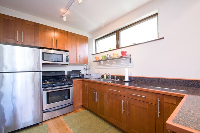 chef's kitchen with built in appliances - 2112 Walnut Ave