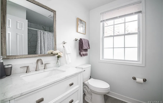 Renovated bathroom with shower. - 309 E Brookland Park Blvd