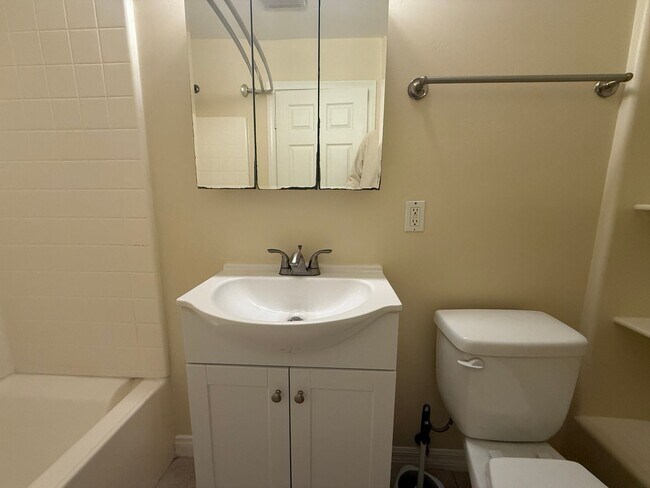 Building Photo - Upgraded Condo with Private Patio, AC, Pool, Gym, and Covered Parking in Gated Community