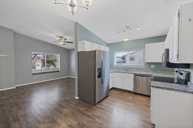 Building Photo - Spacious 4-Bedroom Home with Finished Basement, Large Deck & 2-Car Garage